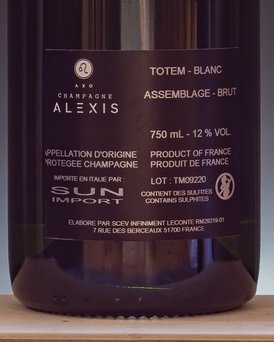Alexis Leconte Champagne Brut Totem Valle Marne Chardonnay Meunier Pinot Nero Vino Francia retro etichetta